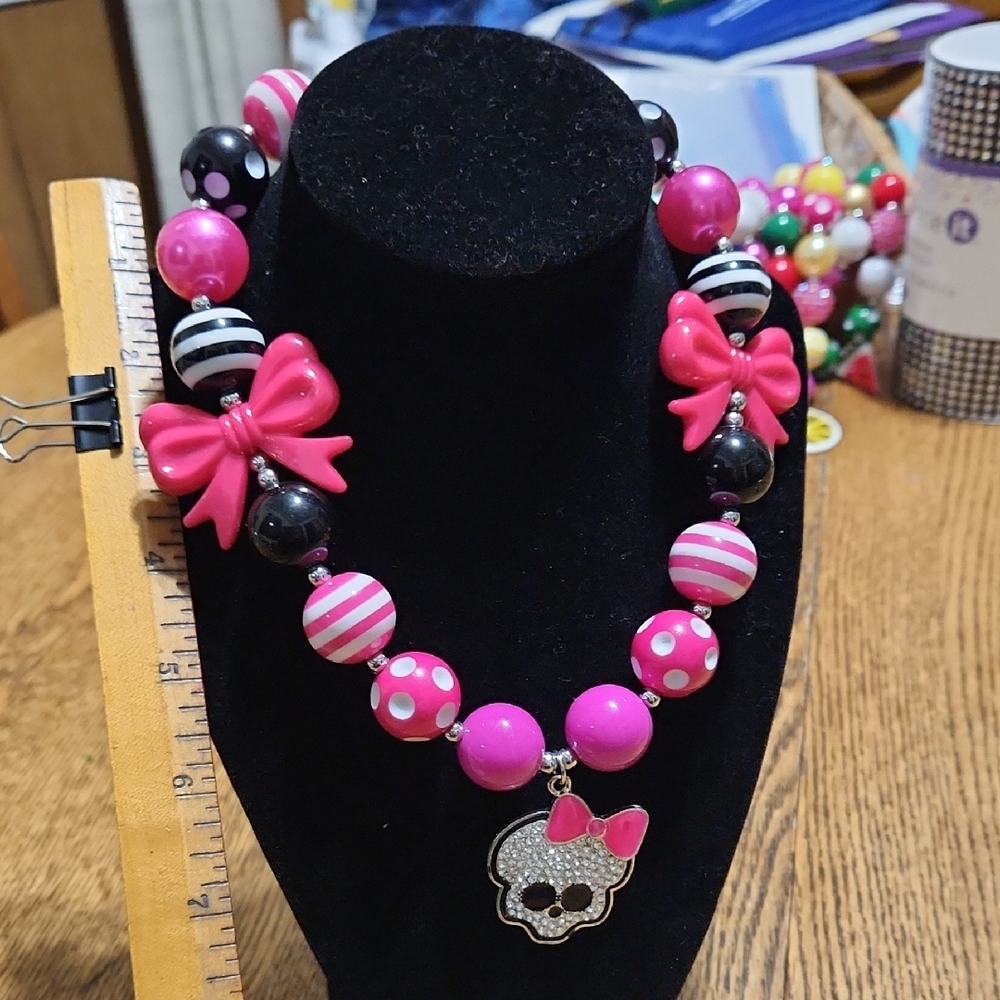 Pink and Black Beaded Necklace with Bow and Skull Pendant